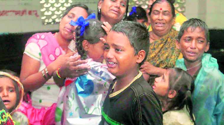 Bereaved members of the Kanojia family in Malad on Friday Bereaved members of the Kanojia family in Malad on Friday